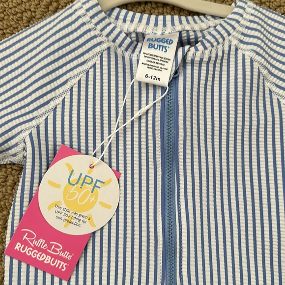 Rugged Butts crinkle blue seersucker short sleeve one piece Rash guard 6-12m NWT - Picture 2 of 3